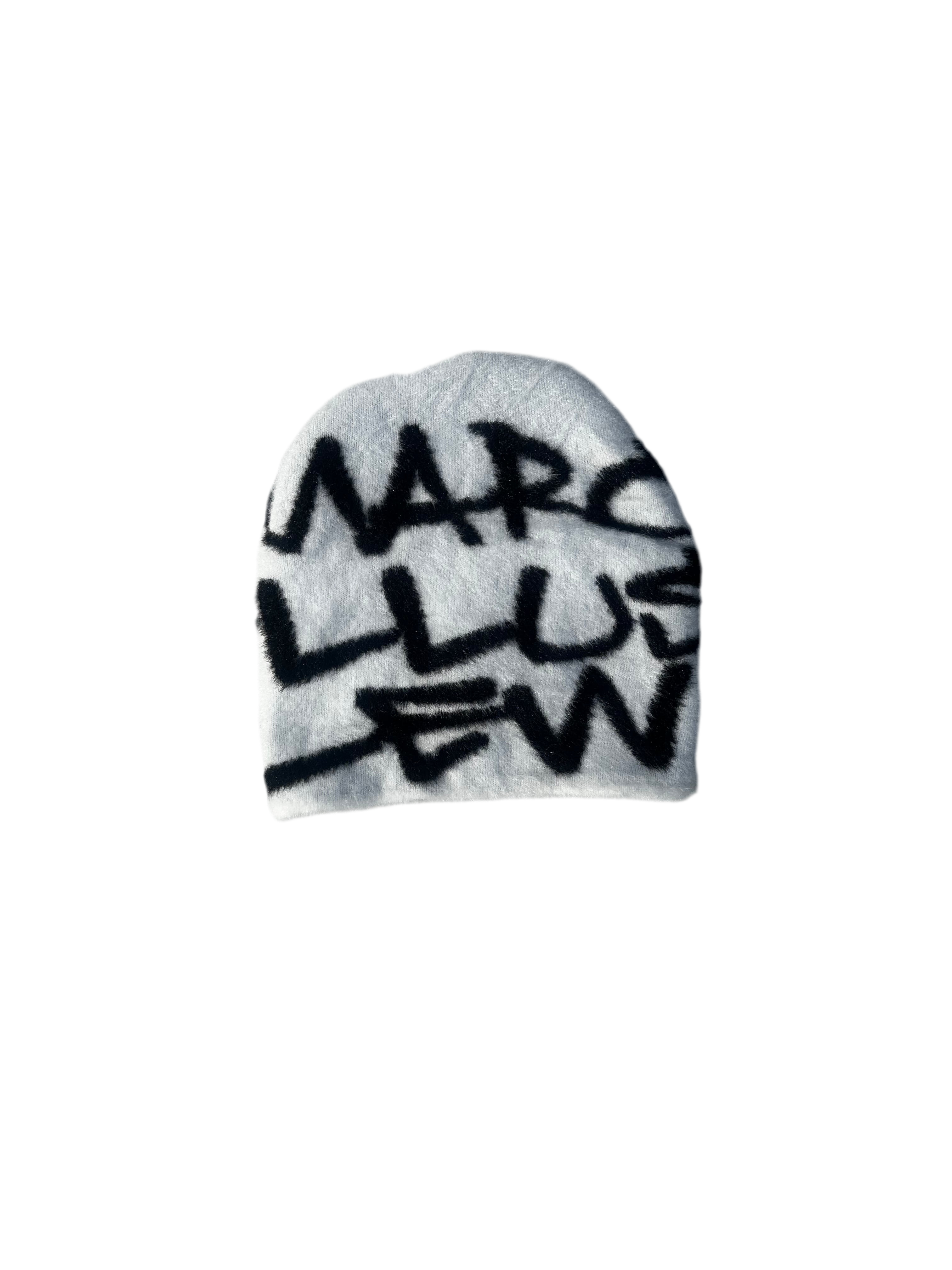 Marcellus Lew Reverse White “Logo Piece Beanie”